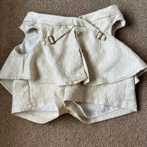 SHEIN mini skort with heart cut-outs on hip bones S